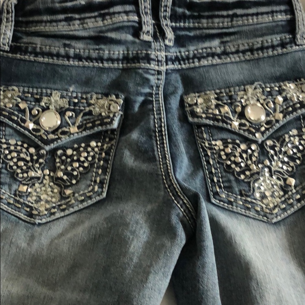 Girl’s Mudd rhinestone jeans.
